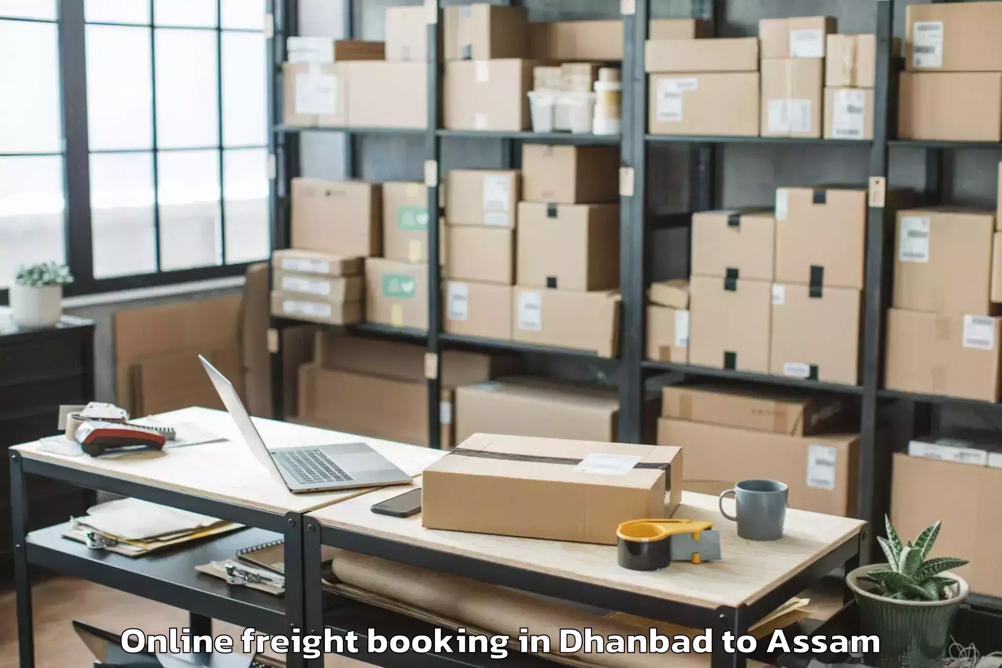 Trusted Dhanbad to Balijan Online Freight Booking